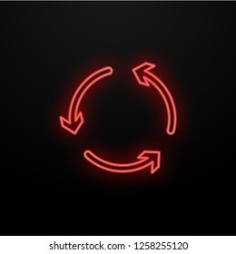 Neon arrow pointer on a black background. The symbol of the arrows. Glowing lamp on black background. Red retro sign on the wall.