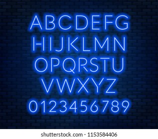 Neon blue alphabet on brick wall background. Capital letter.