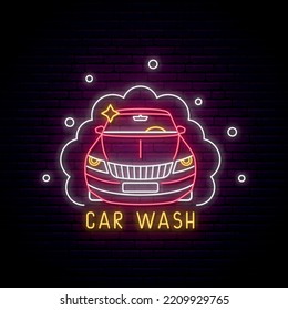 Neon car wash signboard. Glowing car in soap bubles on dark brick wall background. Nigh light banner. Vector illustration.