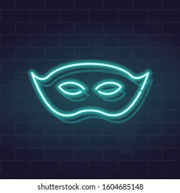 Neon carnival mask icon. Glowing vector illustration on brick wall background. Square fluorescent illustration for social networks.