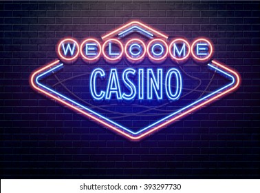 neon casino sign isolated on black brick wall