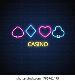 Neon casino sign. Poker, blackjack card suits, spade diamond heart club. Vintage Las Vegas glowing singage banner advertising template design. Gambling game vector illustration brick wall background