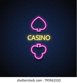 Neon casino sign. Poker, blackjack card suits, spade club. Vintage retro Las Vegas, online casino, bar banner advertising template design. Gambling game vector illustration brick wall background