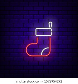 Neon Christmas stocking icon. Neon glowing symbol for new year and Christmas projects, greeting cards, banners, flyers. Bright sign. Editable stroke and blend. Flat vector illustration. 