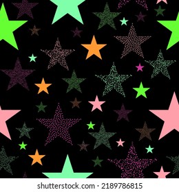 Neon colorful star firework on sky. multicolor lights for xmas or new year eve. Design elements for greeting cards,scrapbooking,print,gift wrap, manufacturing,cloth,textile,fabric and decor.