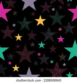 Neon colorful star firework on sky. multicolor lights for xmas or new year eve. Stars and scrapes are laid out in an interesting seamless pattern.