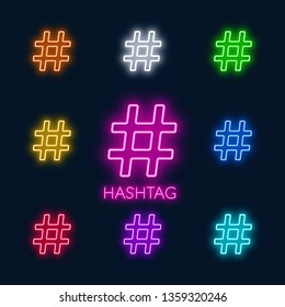 Neon colorful symbols hashtag on a black background.