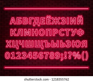 Neon Cyrillic alphabet with numbers on the brick wall background. Can be used for Belarusian and Ukrainian languages.