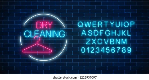 Neon dry cleaning glowing sign with hanger in circle frame with alphabet on a dark brick wall background. Cleaning service signboard design. Vector illustration