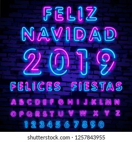 Neon Felices Fiestas, handwritten phrase, translated from Spanish Happy Holidays. Vector Neon light Christmas, New Year illustration on dark background.