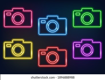 Neon frame. Set of neon cameras of different colors. Laser glowing lines on a black background.