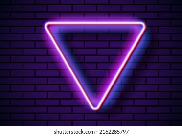 Neon frame with triangle shape on the blue brick wall. Classic rectangular 80s styled purple shiny glowing neon sign.