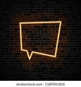 neon glow speech bubble on dark brick wall background
