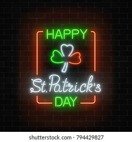 Neon glowing clover leaf sign in ireland flag colors on a dark brick wall background. Green shamrock as Irish national holiday symbol in circle frames. Vector illustration.