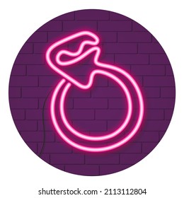 Neon glowing ring on a purple brick wall. Valentine's day concept.