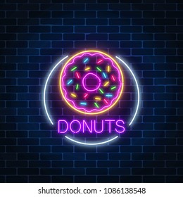 Neon glowing sign of donuts in circle frame on a dark brick wall background. Fastfood light billboard symbol. Cafe menu item. Vector illustration.
