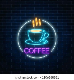 Neon glowing sign of hot coffee cup in circle frame on a dark brick wall background. Fastfood light billboard sign. Cafe menu item. Vector illustration.