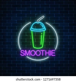 Neon glowing sign of smoothie in circle frame on a dark brick wall background. Fastfood light billboard symbol. Cafe menu item. Vector illustration.