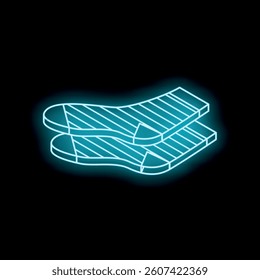 Neon glowing striped socks isolated on black background, representing winter fashion, warmth, and comfort