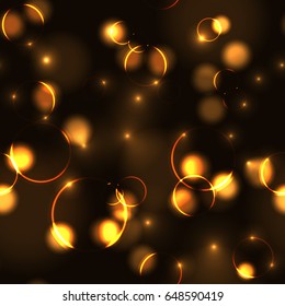 Neon gold bokeh effect seamless pattern. Dark background with Glowing sparkling circles and rings in golden colors. 