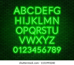 Neon green alphabet on brick wall background. Capital letter.