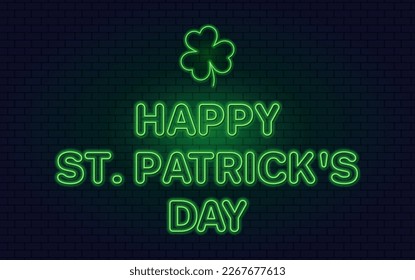 Neon green lettering Happy St. Patrick's Day and clover logo on dark brick wall