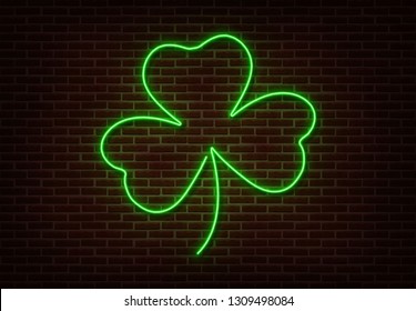 Neon green Shamrock sign vector isolated on brick wall. Light Happy Patric shop decoration element. Neon luck symbol.