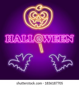 Neon halloween text with pumpkin, candy and bats