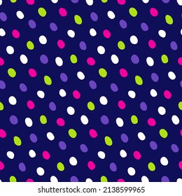 Neon handwritten polka dots wallpaper. Patterned speckled dots of bright green, pink on dark blue background. Seamless mottled fabric. Small circles of simple round shape hand drawn for cover design.