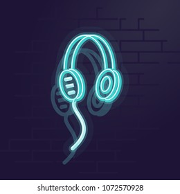 Neon headphones. Night illuminated wall street sign. Isolated geometric style illustration on brick wall background.