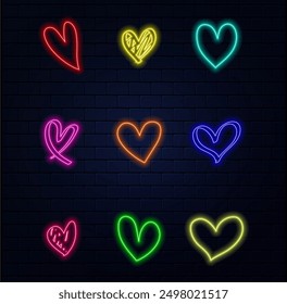 Neon heart with a glow on the background of a dark brick wall. Neon sign..eps