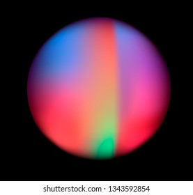 Neon holographic circle on dark background.