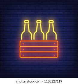 Neon icon of box with bottles. Beer, cold drink, alcoholic beverage. Bar or pub concept. Can be used for signs, billboards, banners