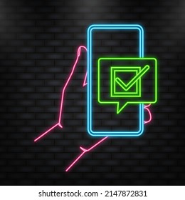Neon Icon. Hand holds phone with check mark on screen on green background. Vector illustration