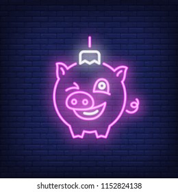 Neon icon of pig shaped New Year bauble. Year of pig concept. Can be used for neon signs, posters, billboards, banners.