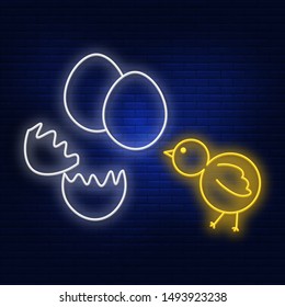 Neon illumination of eggs and chicken. Bright is hatched from an egg chicken. Modern vector logo, banner, shield, pattern, shell, chicken, egg. Night advertising on the background of a brick wall.