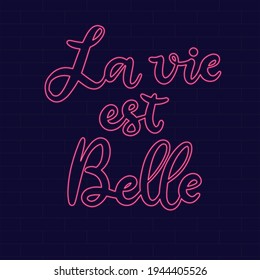 Neon Inspirational phrase. Calligraphic hand lettering motivational inscription Life is beautiful in french language for postcard, poster, wallpaper. Vector illustration.