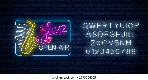 Neon jazz festival banner with retro microphone, saxophone and lettering in rectangle frame with alphabet on dark brick wall background. Jazz music open air flyer. Vector illustration.