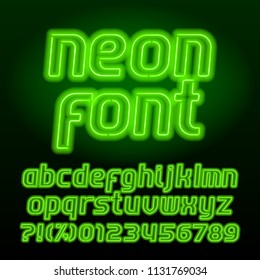 Neon lamp alphabet font. Neon color lowercase letters, numbers and symbols. Stock vector typeface for any typography design.