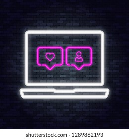 Neon laptop with likes and fans on brick wall. Vector illustration.