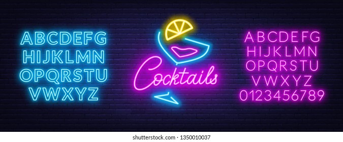 Neon lettering cocktails on brick wall background.