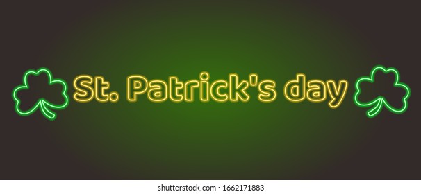 Neon lettering St. Patrick's day adn shamrock. Light banner.