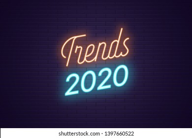 Neon lettering of Trends 2020. Glowing headline, bright neon cursive text of Trends 2020. Title template for web banner and poster. Orange and blue color