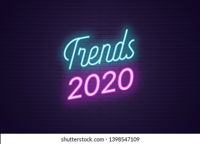 Neon Lettering Of Trends 2020. Glowing Headline, Bright Neon Cursive Text Of Trends 2020. Title Template For Web Banner And Poster. Blue And Purple Color