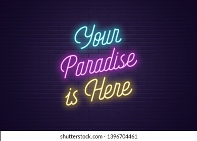 Neon lettering of Your Paradise is Here. Glowing headline, bright neon cursive text of Your Paradise Here. Title template for web banner and poster. Blue, purple and yellow color
