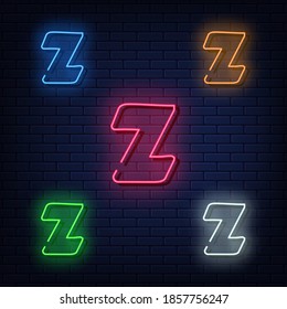 Neon letters, five colors red, blue, green, yellow, white. Isolated font on dark blue brick wall background. Vector illustration eps 10.