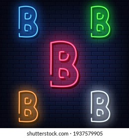 Neon letters, five colors: red, blue, green, yellow, white. Isolated font on a blue brick wall background. Vector illustration eps 10.