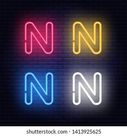 Neon letters, four colors red, yellow, blue, white, isolated font on dark blue brick wall background. Vector illustration eps 10.
