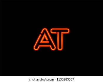 Neon letters A and T logo. Red light glowing neon logo icon vector illustration.