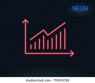 Neon light. Chart line icon. Report graph or Sales growth sign. Analysis and Statistics data symbol. Glowing graphic design. Brick wall. Vector